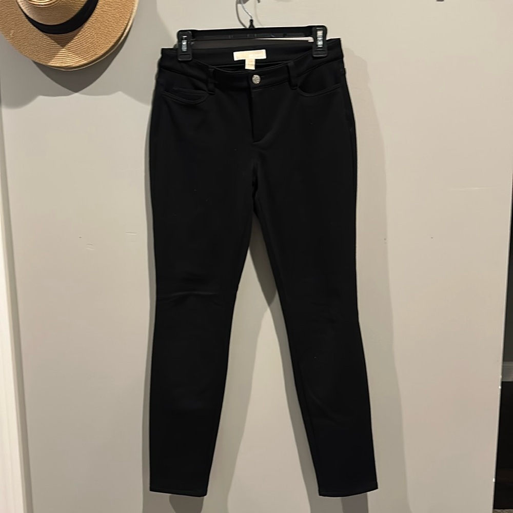 Michael Kors black pants - stretch dress pants with jeans styling. Size 4.